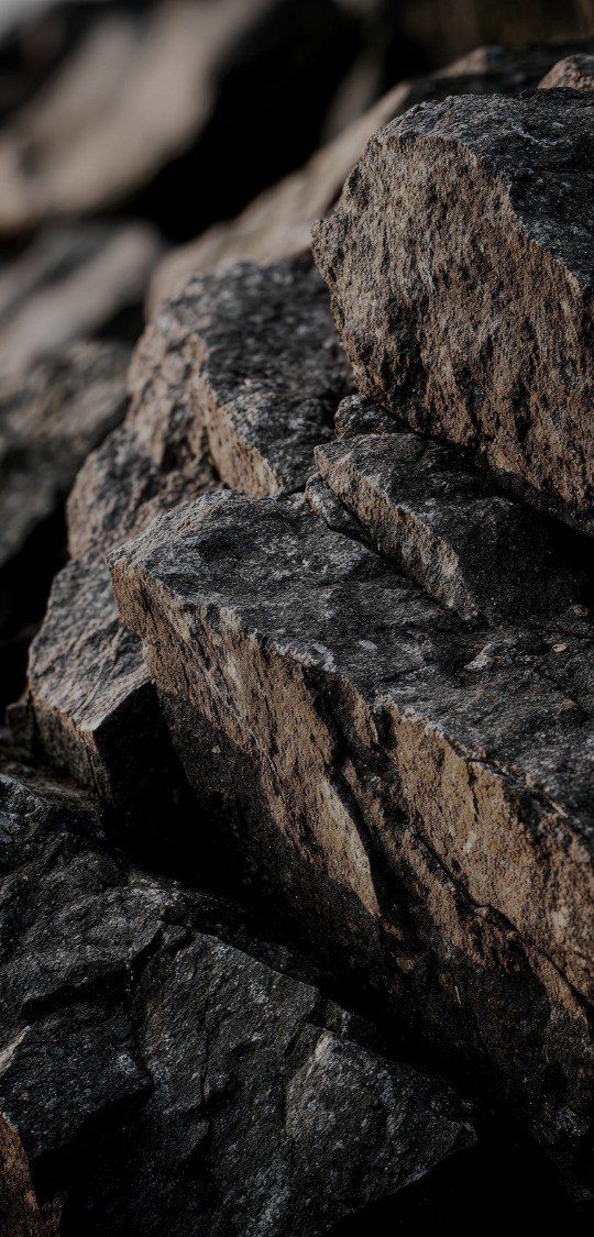 Dark mineral ore, close detail